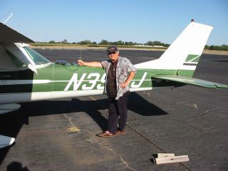 Dave, KC6YFG, with his airplane, testing wireless router setup