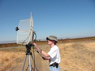 Robert, KC6UDS, aims the dish